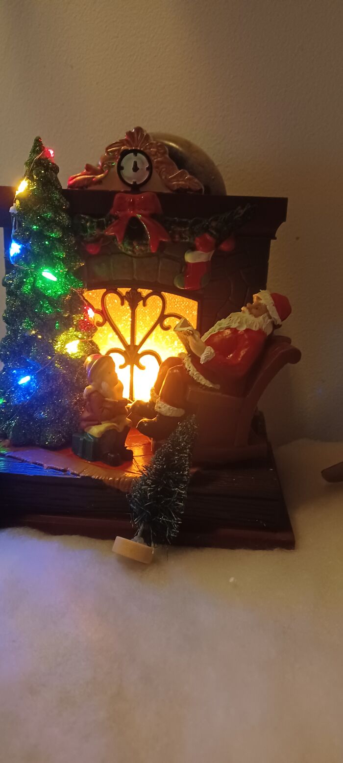 My Little Snowman That I Painted And My Santa By The Fire. I Collect Santas. Christmas Is My Favorite Holiday. 😍