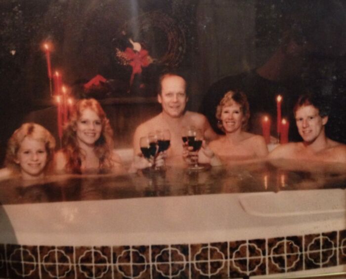 My parents just got a hot tub and were very excited about it.  For some reason they posed with wine and candles even though the kids weren't old enough to drink