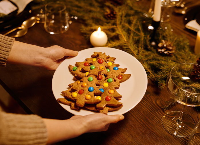 cookie in the form of christmas tree on a white plate