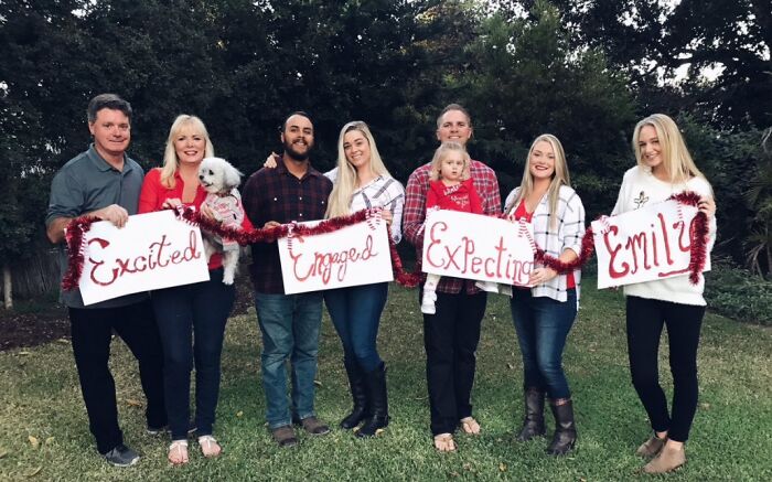 For The Family Christmas Photo, Everyone Had To Make A Sign With Their Relationship Status
