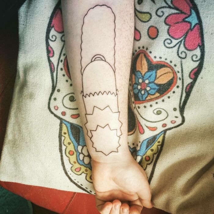 Minimalist Simpsons family forearm tattoo