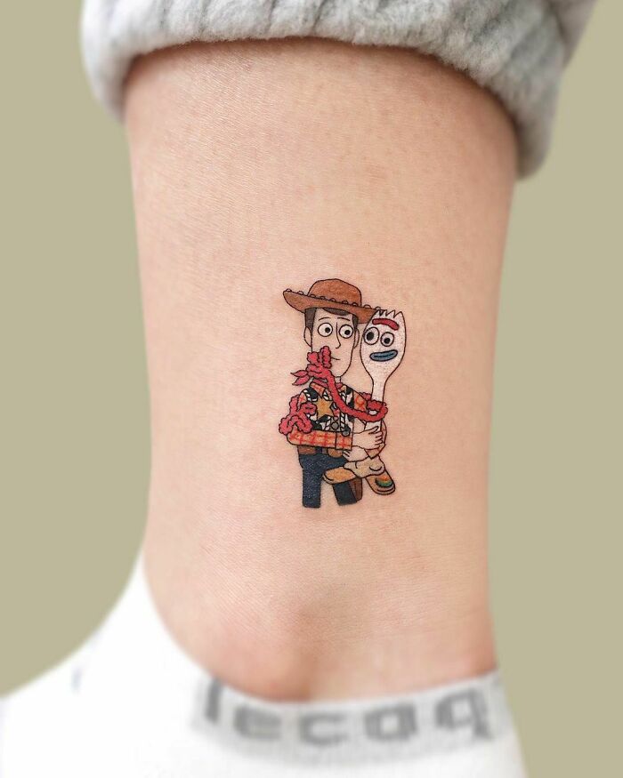 Woody from Toy Story leg tattoo