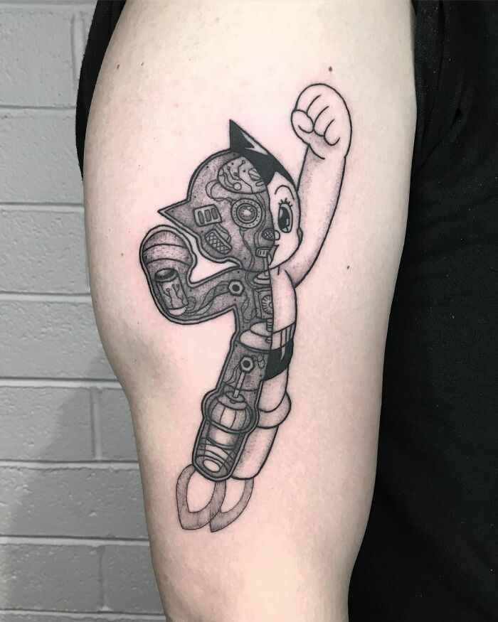 The Astro Boy arm tattoo