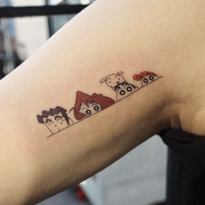 Crayon Shin Chan and family arm tattoo