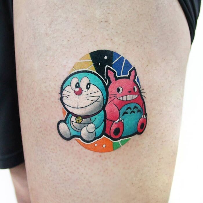 Colorful Doraemon and Tororo tattoo