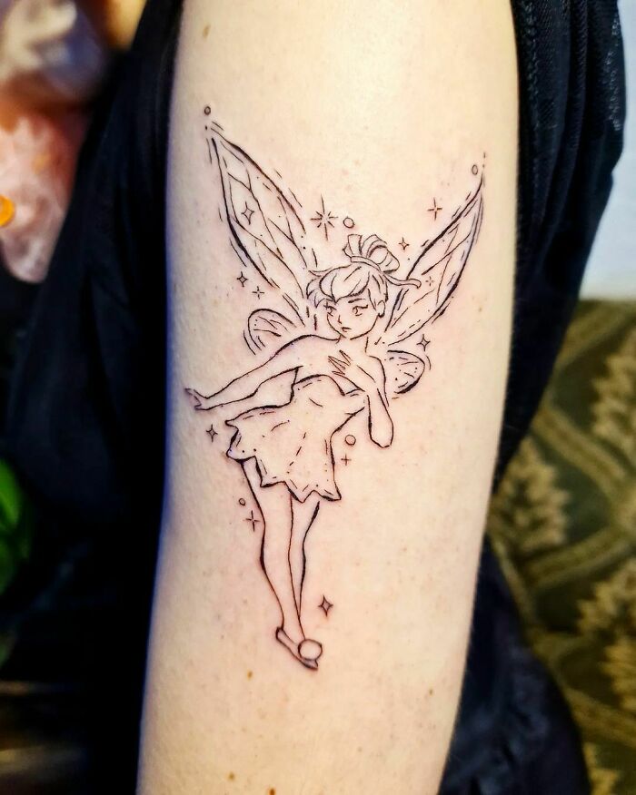 Tinkerbell arm tattoo