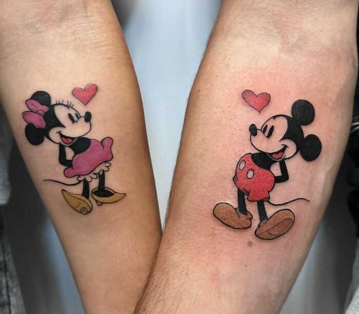 Mickey Mouse and Minnie arm tattoos