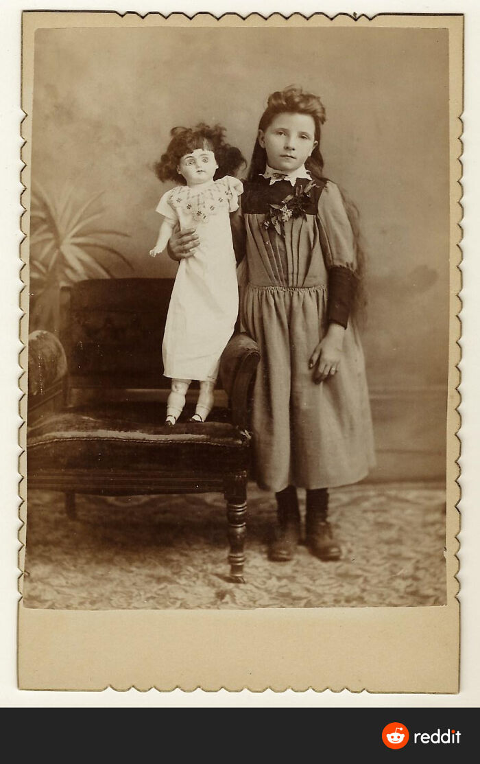 Strange Picture Of A Girl & Her Doll