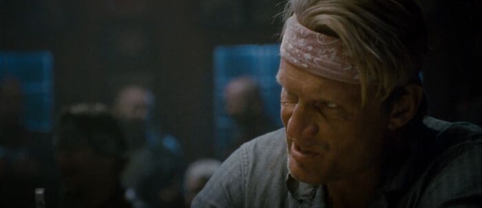 In The Expendables 2 (2012) Dolph Lundgrens Character, Gunnar, Is Said To Have Achieved A Masters In Chemical Engineering Then Quit To Be A Bouncer In Attempt To Form A Relationship With "This Girl". All Of Which Dolph Lundgren Actually Did In Real Life. The Girl Was Grace Jones