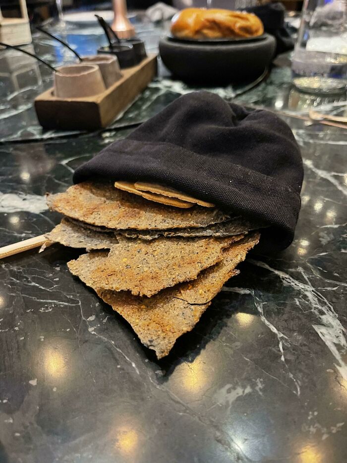 High-End Steakhouse In Mexico City Serves Tortilla Chips In… A Hat? A Bag?
