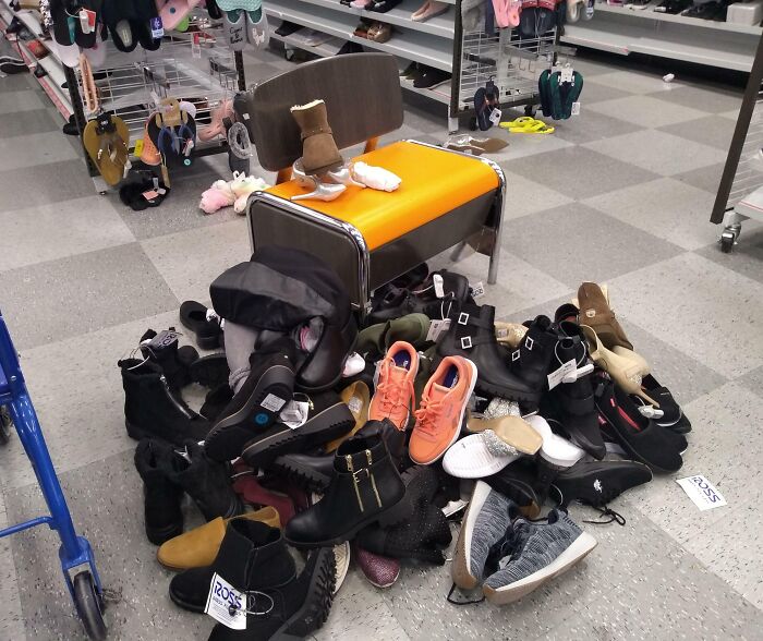 Someone Tried On All These Shoes And Left Them On The Floor