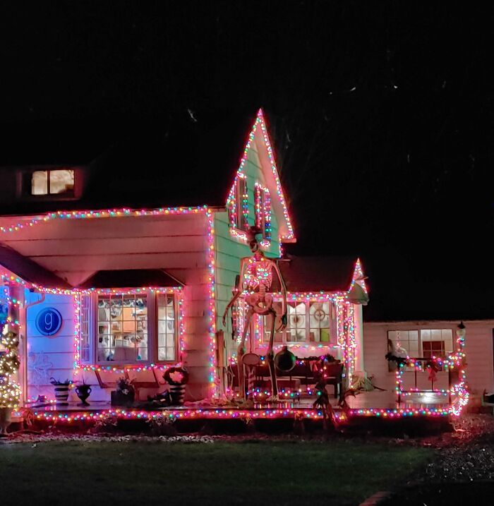 Someone Decorated Their Giant Skeleton For Christmas