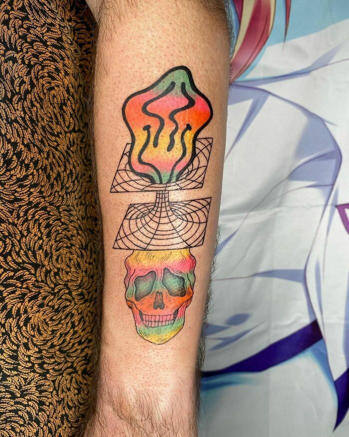 Trippy skull changed dimensional arm tattoo