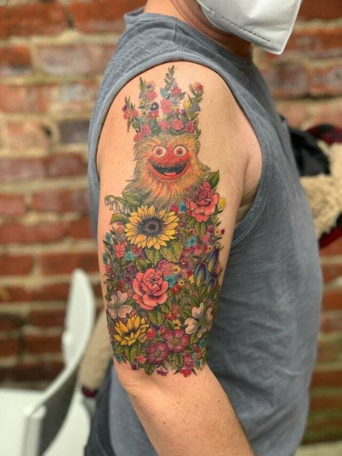 Flower monster shoulder tattoo