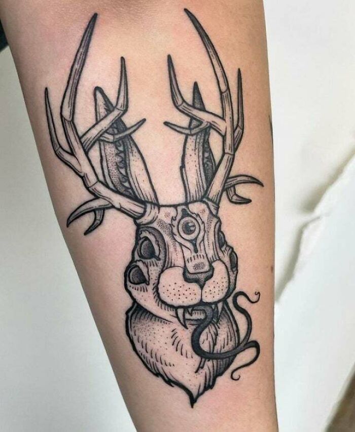 Evil monster deer arm tattoo