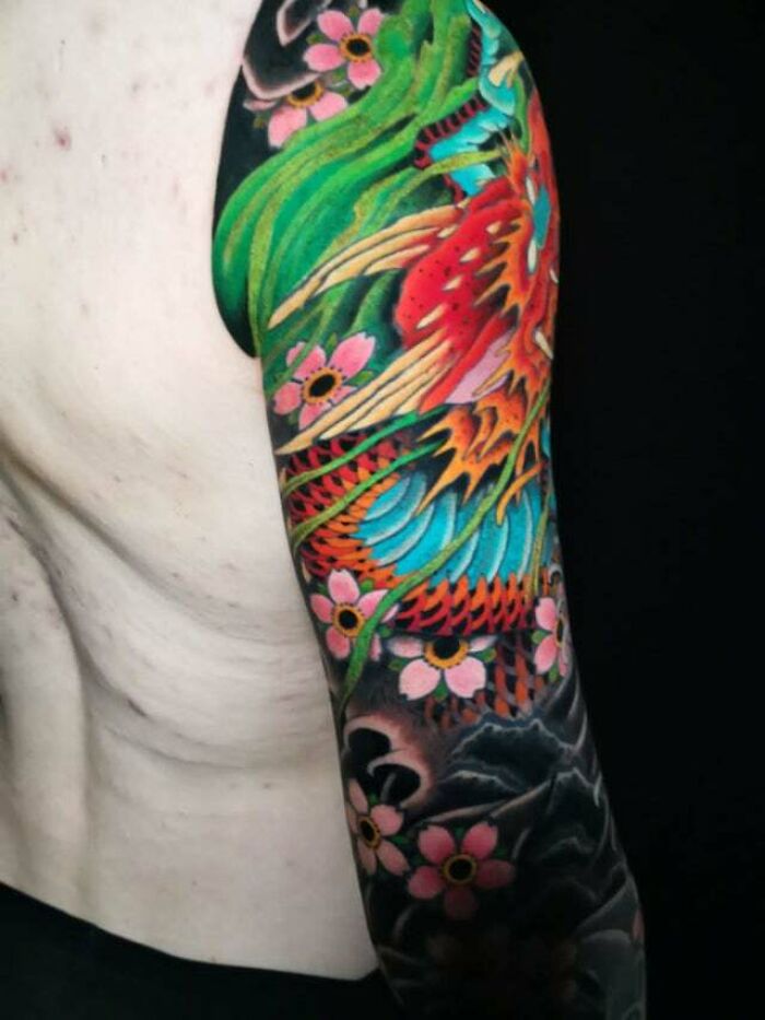 Colorful flowers with nature arm sleeve tattoo
