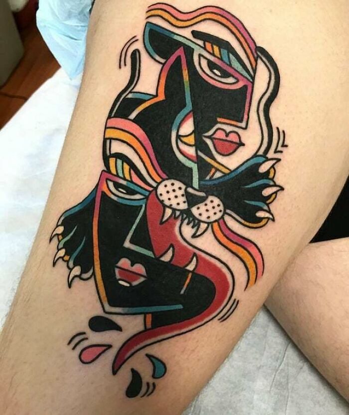 Deconstructed panther faces leg tattoo
