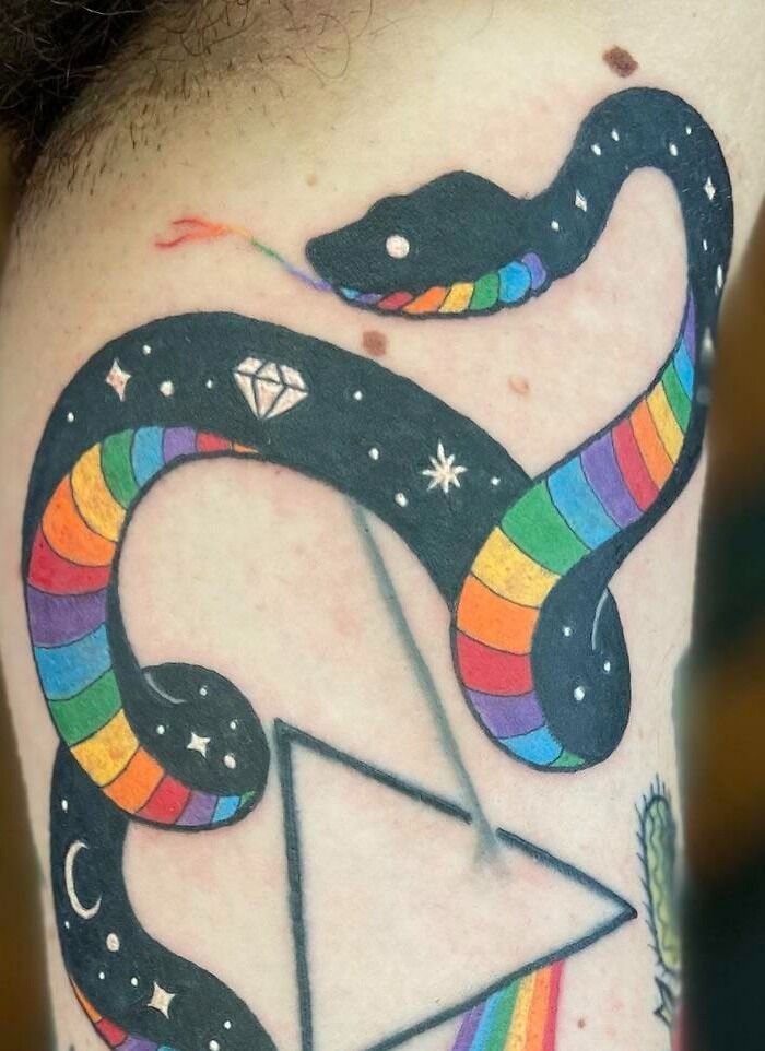 Colorful night with diamonds snake leg tattoo