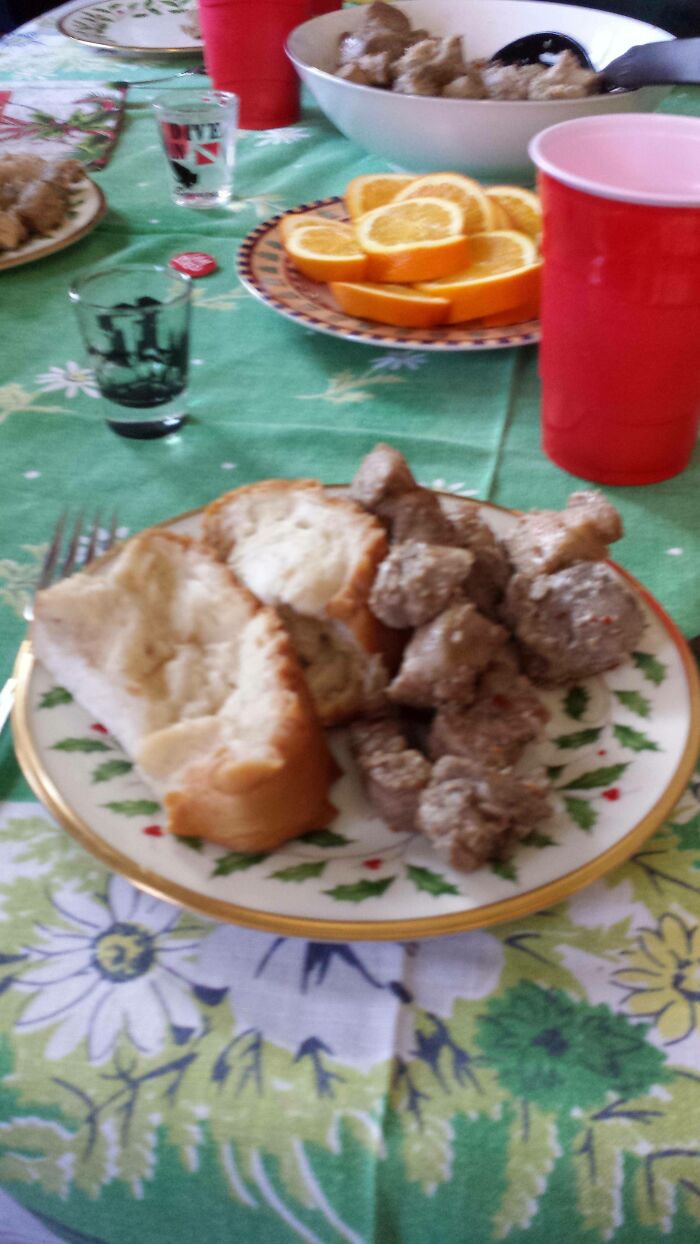 Our Family's Traditional Christmas Breakfast: Pickled Pork, Bread Soaked In Pickled Pork Juice, Oranges, Shot Of Gin