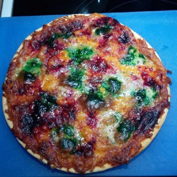 Husband's Xmas Dinner: Frozen Pizza Enhanced With Red And Green