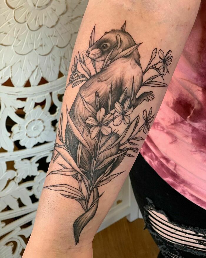 Ferret with flowers tattoo 