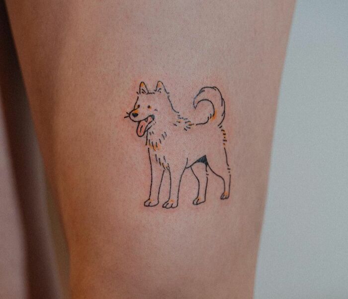 Dog leg tattoo