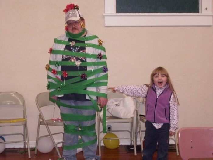 We Played A Game Where The Kids Had To Decorate One Of Their Parents Like A Christmas Tree