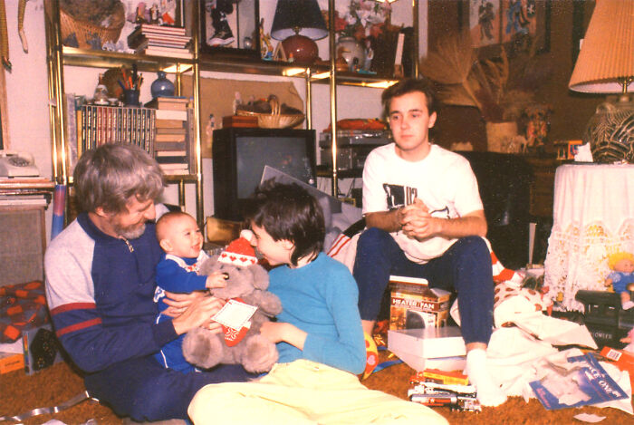 This Is A 1987 Christmas Morning Aftermath With Me, My 6-Month-Old Son Nathan, My 12-Year-Old Son Justin And My 17-Year-Old Stepson Damond. Damond Looks Thrilled With His Present Of A New Heater/Fan