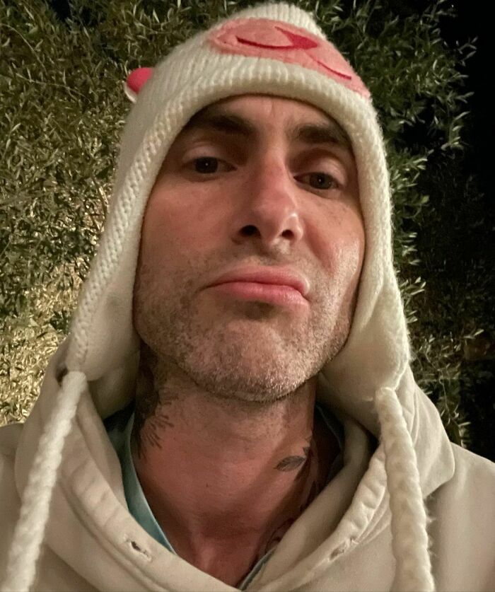 Adam Levine - Balancing A P-Cap On His Nose