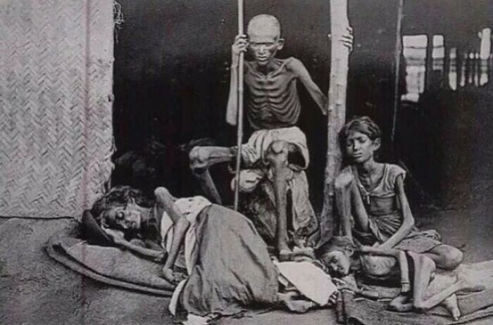 A Man Guards His Family From The Cannibals During The Madras Famine Of 1877 At The Time Of British Raj, India