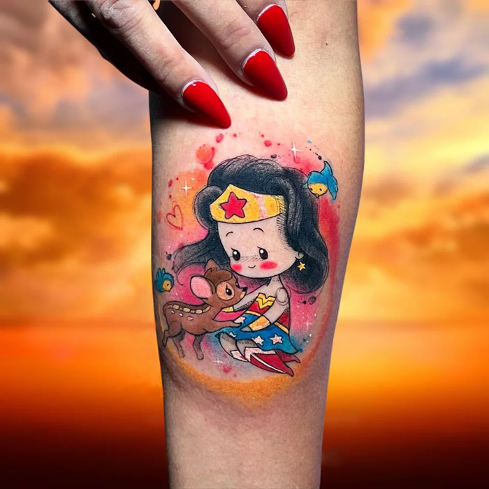 Bambi and Wonder Woman arm tattoo