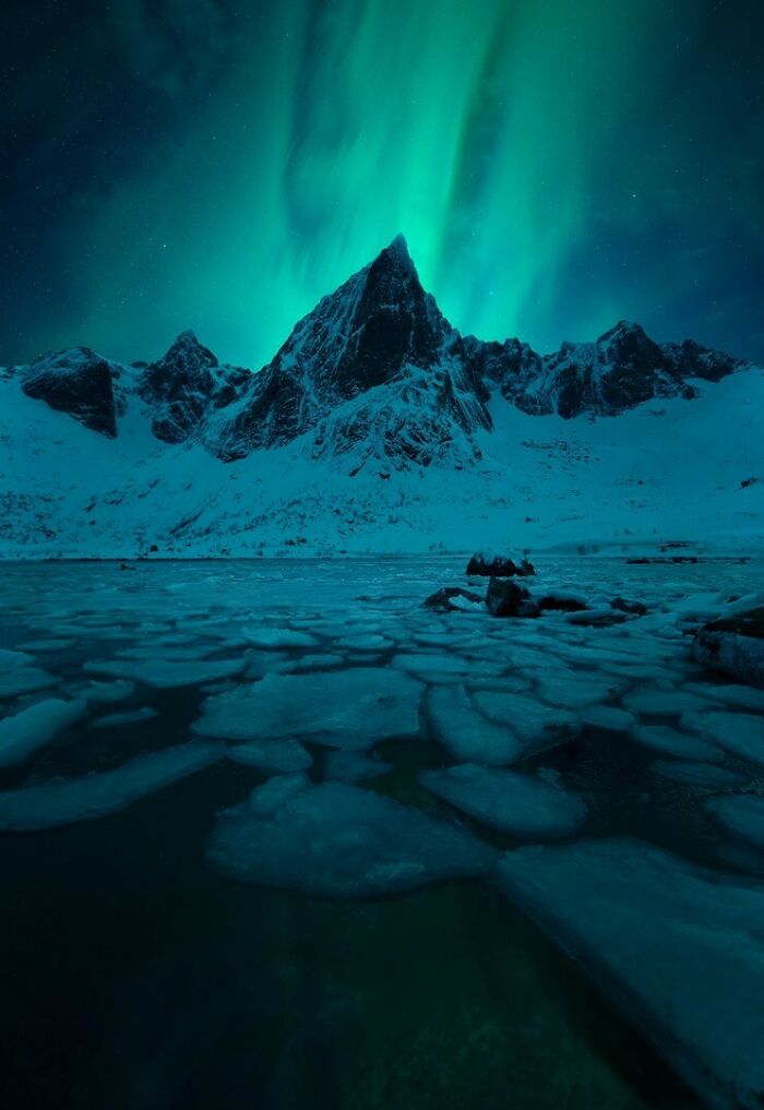 “Northern Lights Over Dramatic Lofoten Peaks” By David Haring