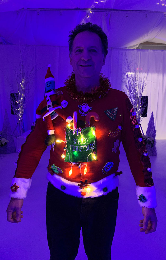 My Dad Entered An Ugly Christmas Sweater Competition But Lost To Someone With A Store Bought Sweater. That $1000 Should Have Been His. He’s Proud Anyways