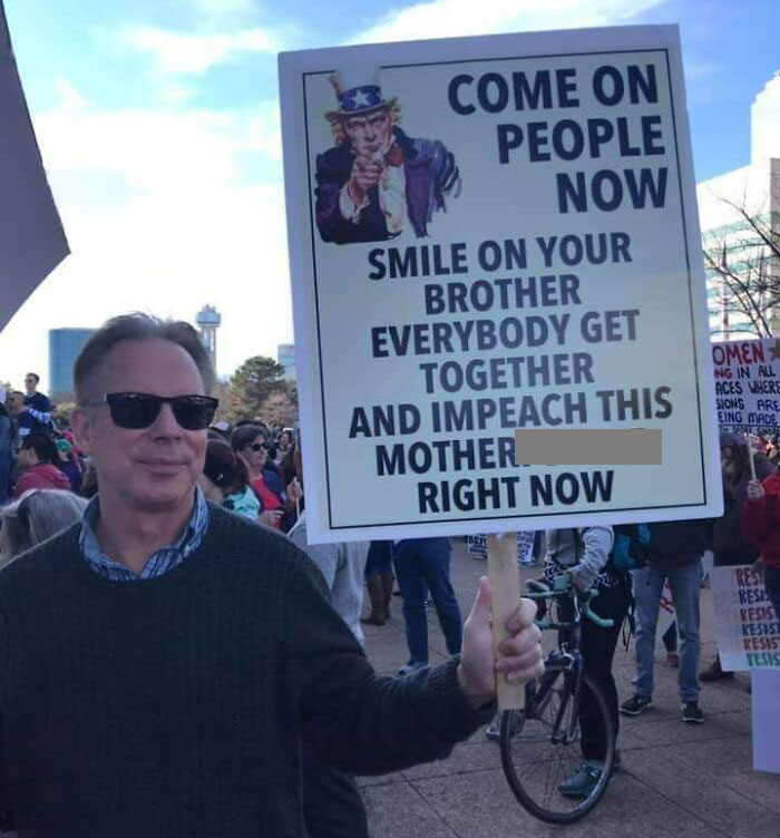 Clever Use Of An Old Song On Protest Sign