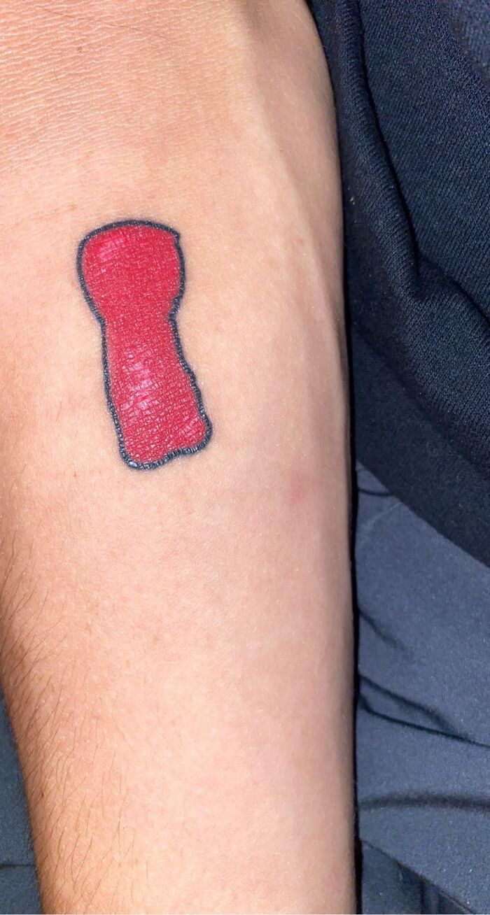 This Is My Friends First Tattoo. ( Supposed To Be A Sour Patch Kid) And Yes It Was Done Professionally,the Guy Tried To Charge Him $100