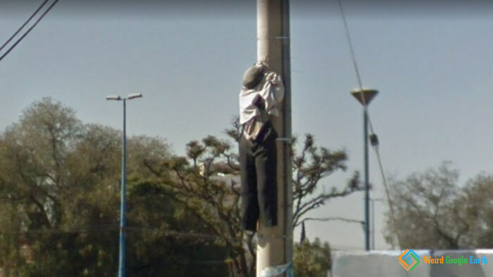 "Creepy Hanging Man". Location: Cochabamba, Olivia