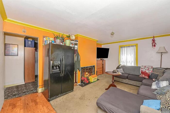 A House For Sale Near Me. A Refrigerator In The Living Room, And The Wall Color!