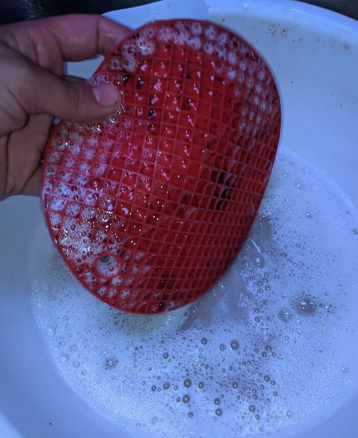 Silicone Hot-Pad With Little Squares. I've Tried Soaking And A Scrub Brush And More Soaking And More Scrubbing, Repeat, And Am Now Convinced They Were Designed By People Who Didn't Have To Clean Them