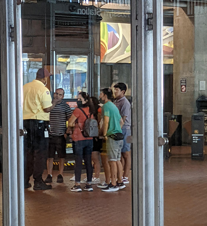 Security Had To Reprimand These Tourists For Pushing Emergency Stop On The Rosslyn Metro Escalator To Take A Group Photo During Rush Hour