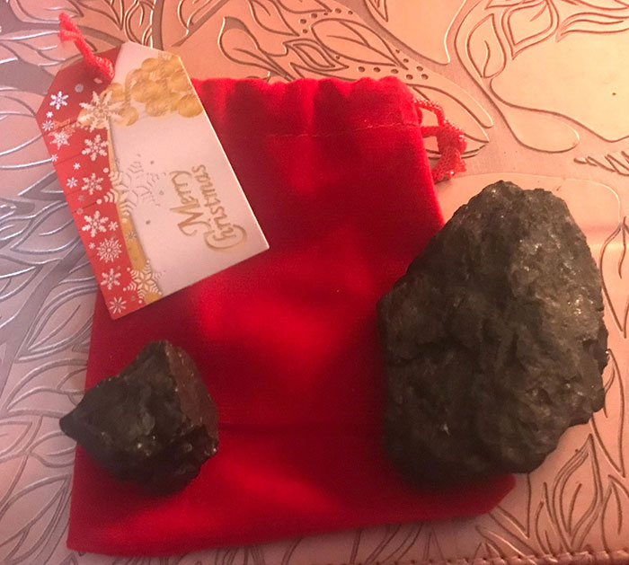 Person Goes To Celebrate Christmas With Fiancé's Family For The First Time, Loses It After Getting 18 Pieces Of Coal As Gifts