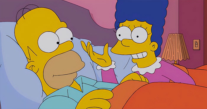 Homer and Marge Simpson lying in bed from The Simpsons