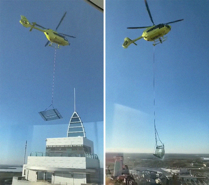 Transporte de un gran panel de vidrio en helicóptero