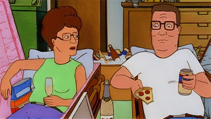 Peggy and Hank Hill drinking and eating from King Of The Hill