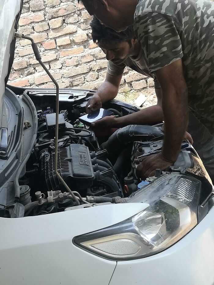 Guys Who Came To Fix My Car Are Watching A Tutorial.... To Fix The Car