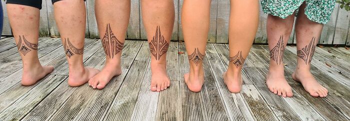 Matching ankle tattoos