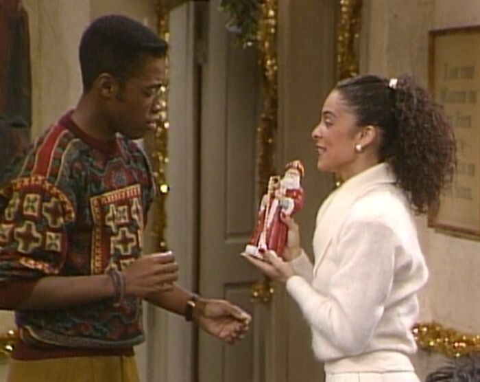  Whitley showing Santas' toy to Dwayne