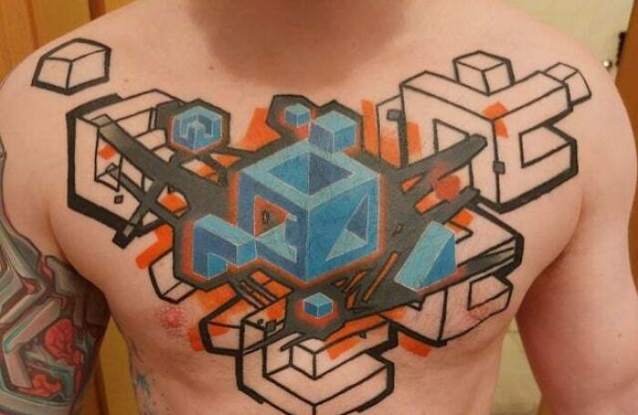 Cute mosaic chest tattoo