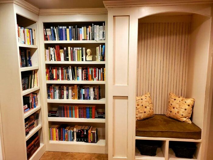 White bookshelf inside the wall
