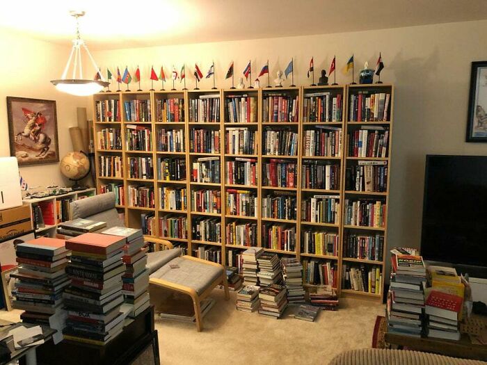 home library with brown bookshelves 