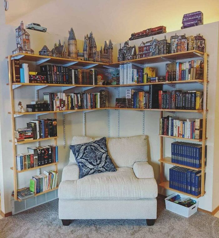 White chair near bookshelves 